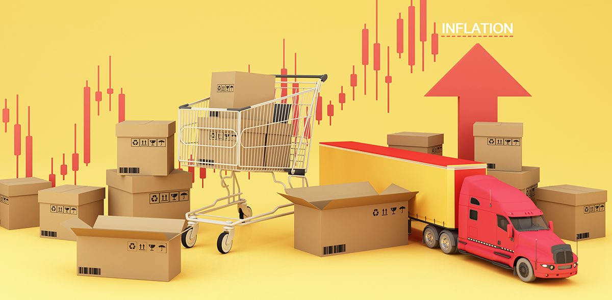 A stock image of boxes stacked around a shopping cart and small semi-truck,