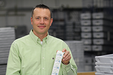 Person holding up Labels